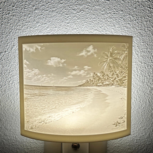 White tropical beach lithophane night light featuring palm trees, ocean waves, sandy shoreline, and seashell details, softly glowing curved coastal decor for bedrooms, bathrooms, beach houses, or relaxing spaces.