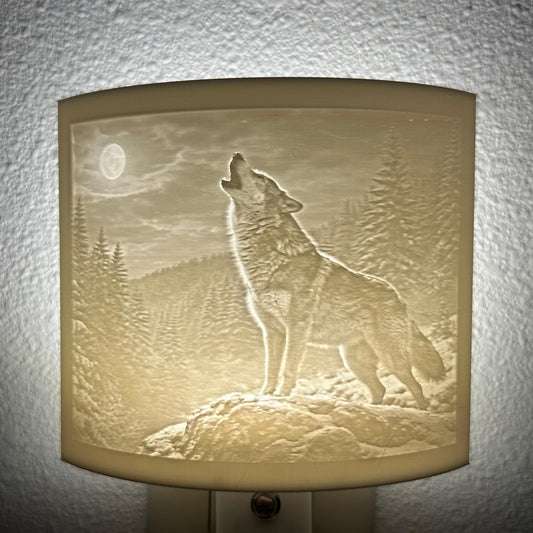 White wolf lithophane night light featuring a detailed howling wolf beneath a full moon in a forest landscape, softly glowing curved wildlife-themed decor for bedrooms, cabins, lodges, or rustic spaces.