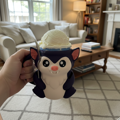 Cute bat ice cream mug holding a scoop of vanilla ice cream, novelty animal mug for dessert and fun kitchen gifts.