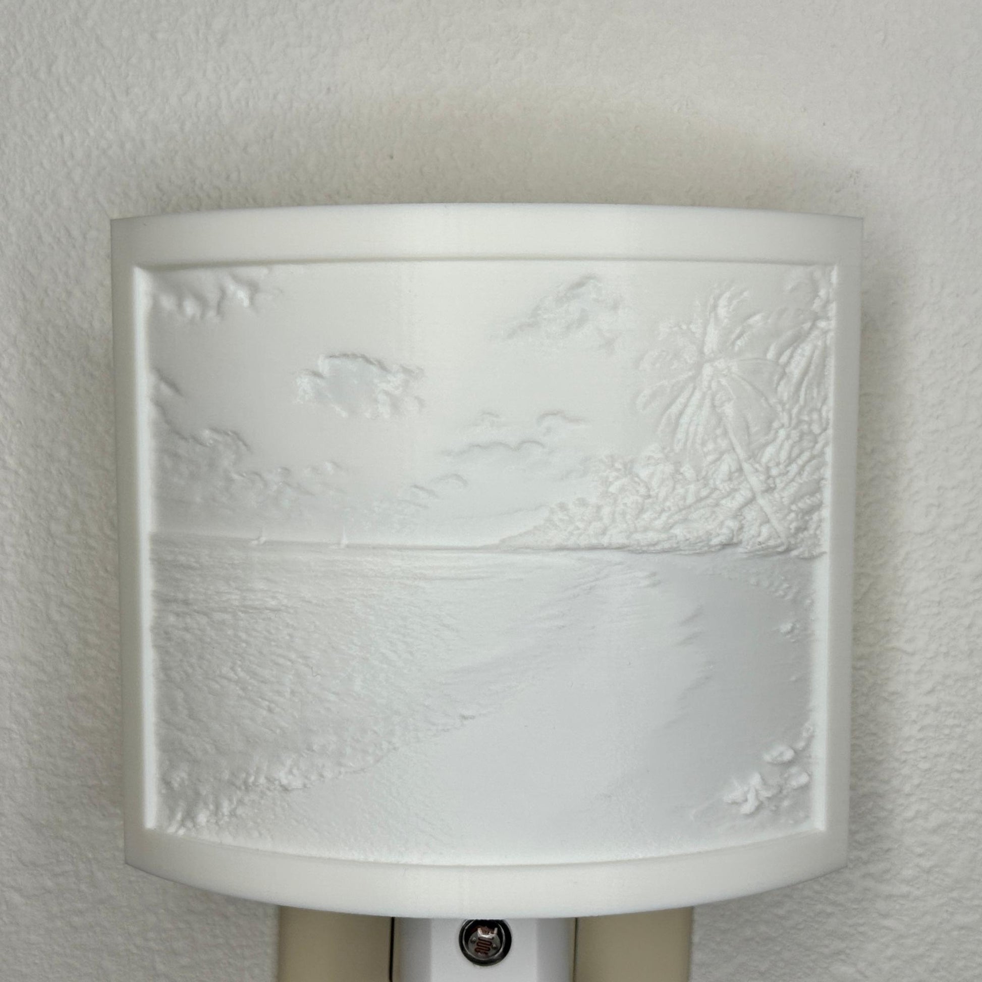 White tropical beach lithophane night light with embossed palm trees, ocean waves, sandy shoreline, and seashell details, curved coastal decor for bedrooms, bathrooms, beach houses, or relaxing spaces.