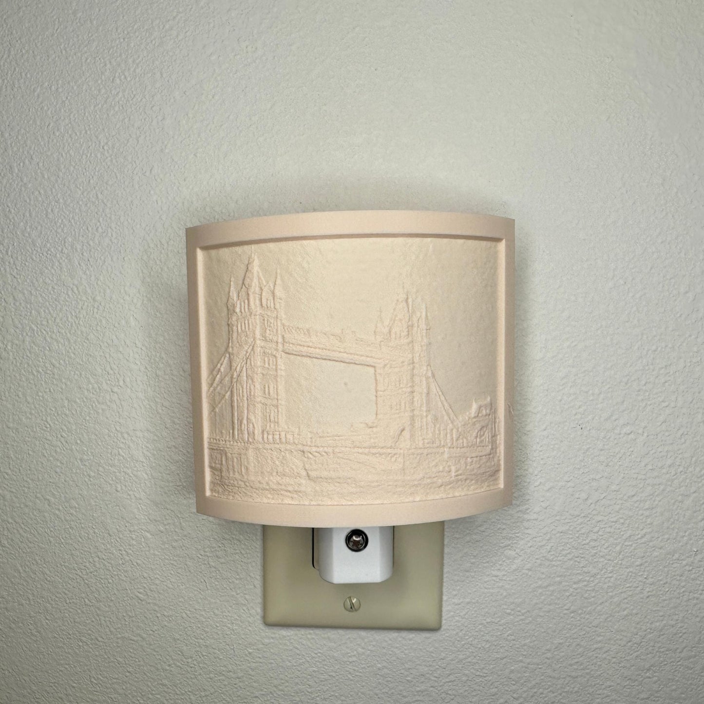 Beige Tower Bridge lithophane night light with embossed London bridge cityscape design, curved travel-themed decor for bedrooms, offices, hallways, or architecture lovers.
