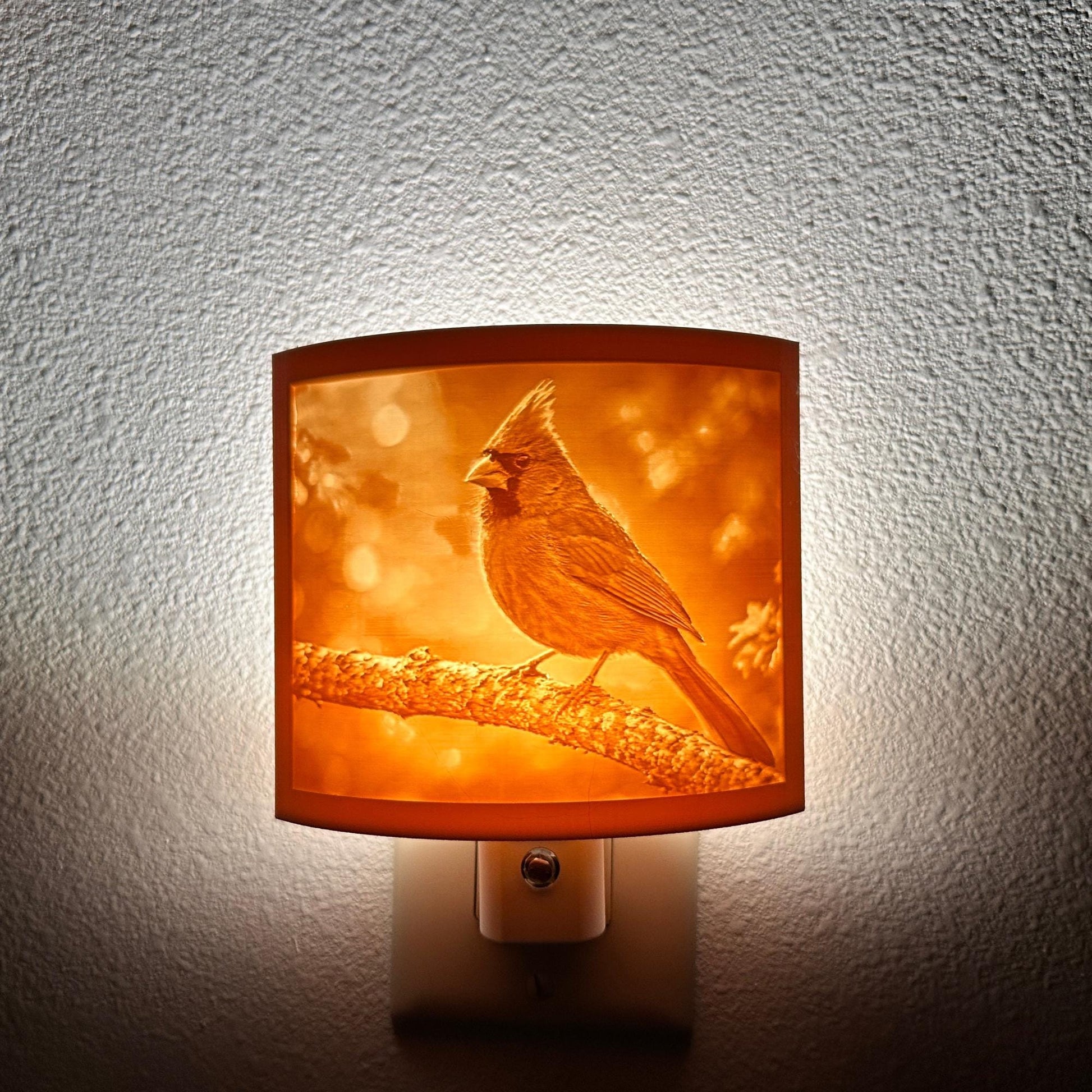Warm glowing cardinal lithophane night light featuring a detailed cardinal perched on a tree branch, curved bird-themed decor for bedrooms, hallways, cabins, or nature-inspired spaces.
