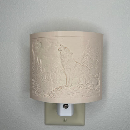 Beige wolf lithophane night light with embossed howling wolf beneath a full moon in a forest landscape, curved wildlife-themed decor for bedrooms, cabins, lodges, or rustic spaces.
