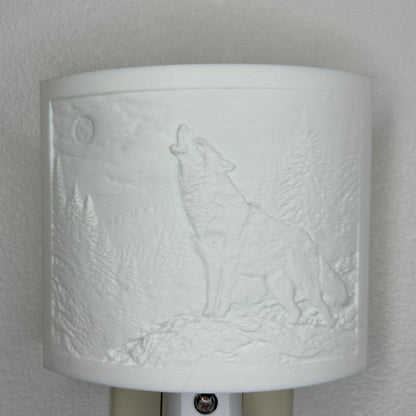 White wolf lithophane night light with embossed howling wolf beneath a full moon in a forest landscape, curved wildlife-themed decor for bedrooms, cabins, lodges, or rustic spaces.